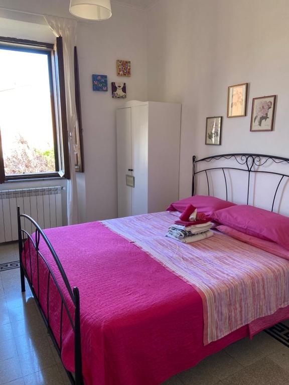 Postel nebo postele na pokoji v ubytování Tuscany Location