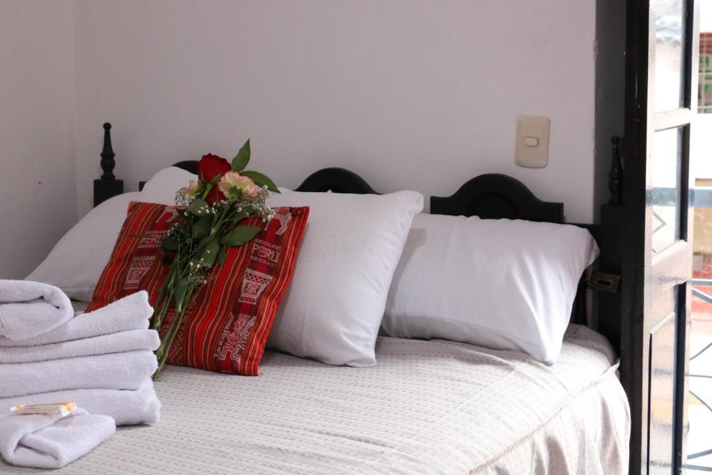 Postel nebo postele na pokoji v ubytování Millas House Cusco