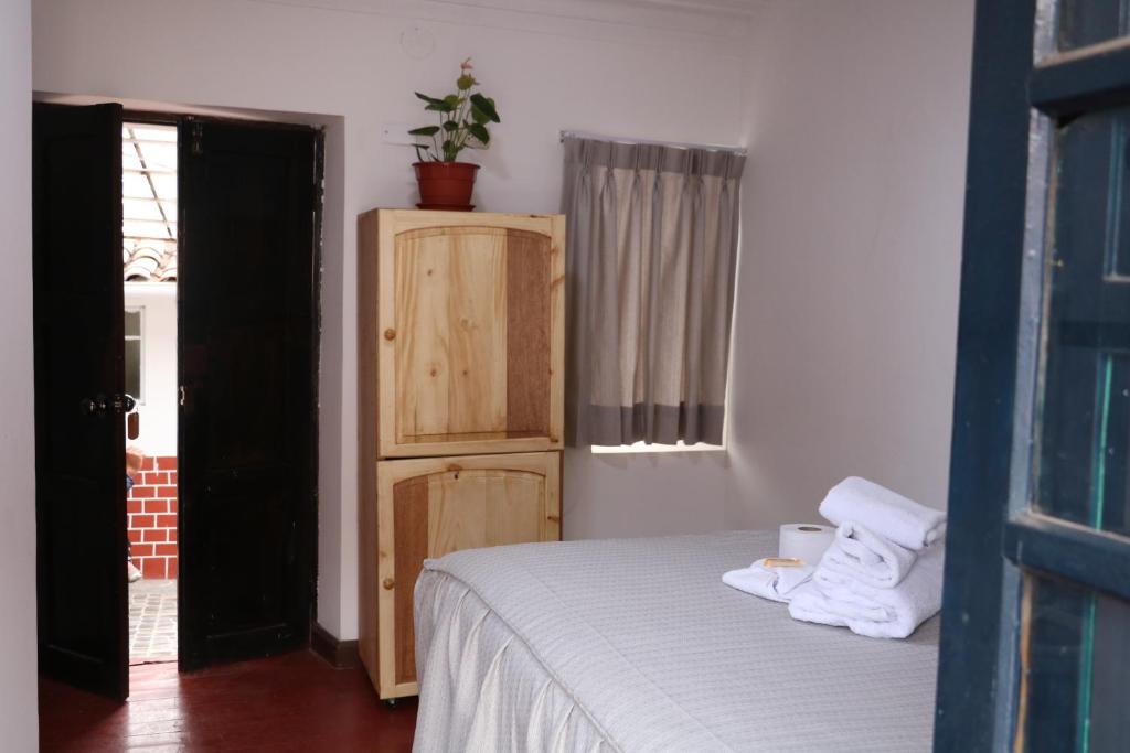 Postel nebo postele na pokoji v ubytování Millas House Cusco