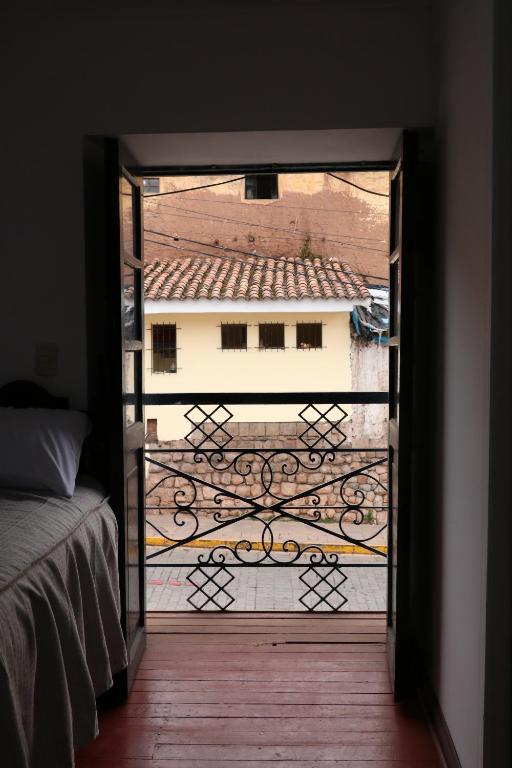 Postel nebo postele na pokoji v ubytování Millas House Cusco