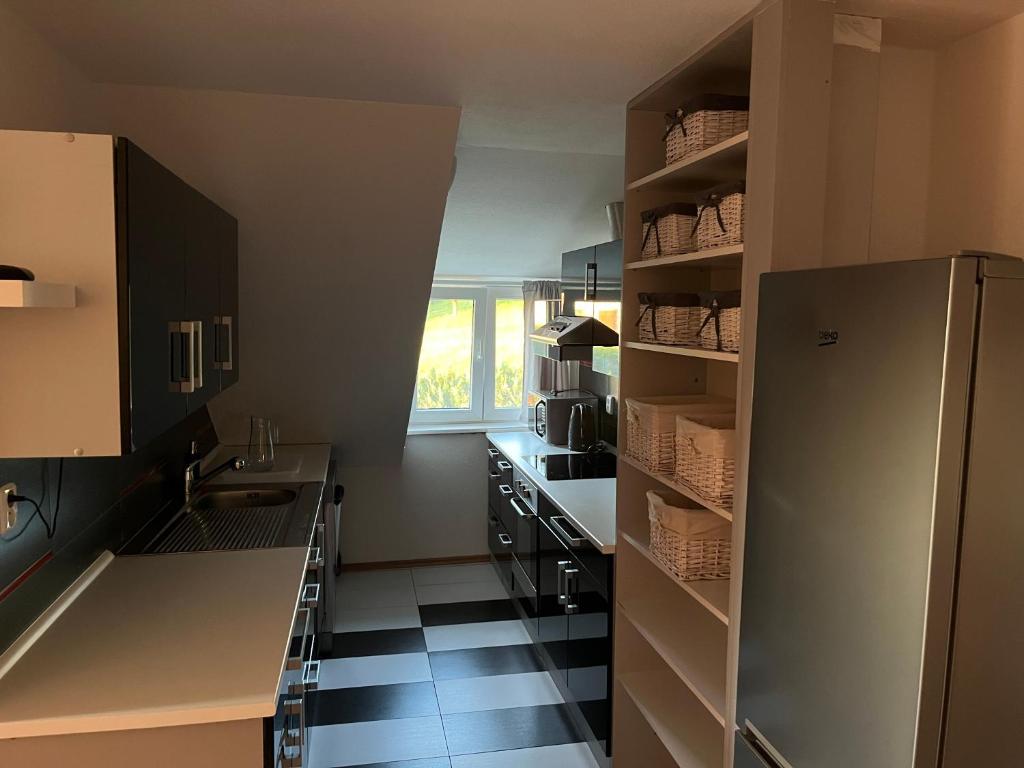 Kuchyň nebo kuchyňský kout v ubytování Apartman Na Bubnu