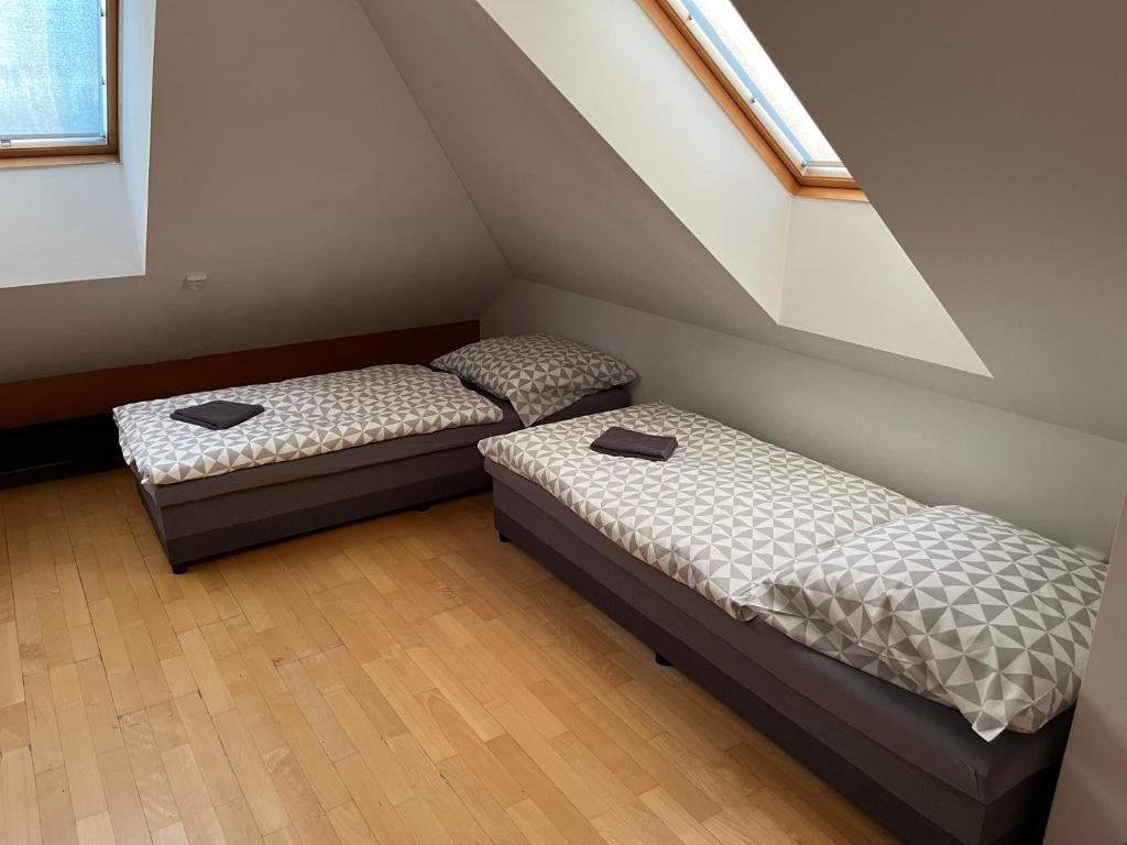 Postel nebo postele na pokoji v ubytování Apartman Na Bubnu