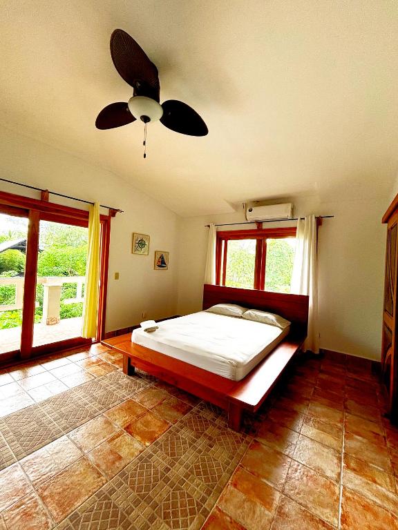 Postel nebo postele na pokoji v ubytování Royal Palm Retreat