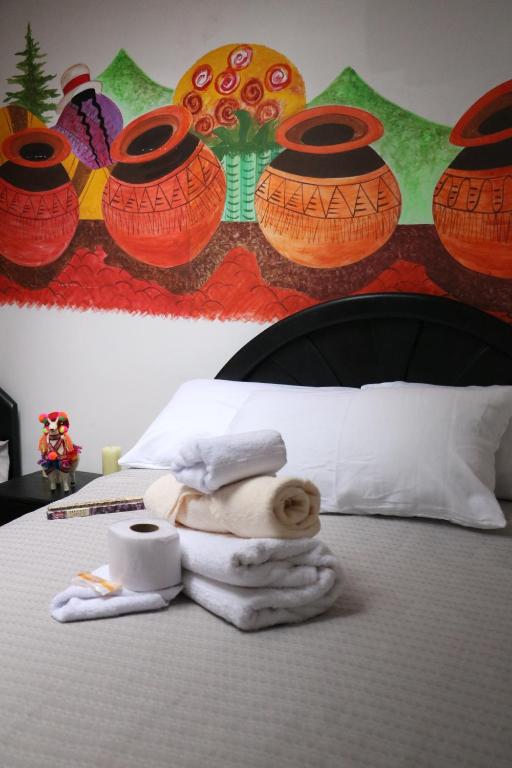 Postel nebo postele na pokoji v ubytování Millas House Cusco