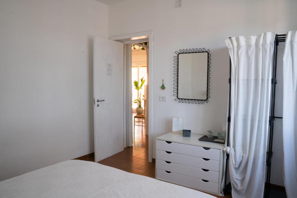Postel nebo postele na pokoji v ubytování Villa Dan-Rooms in Monopoli