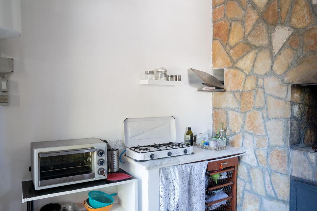 Kuchyň nebo kuchyňský kout v ubytování Villa Dan-Rooms in Monopoli