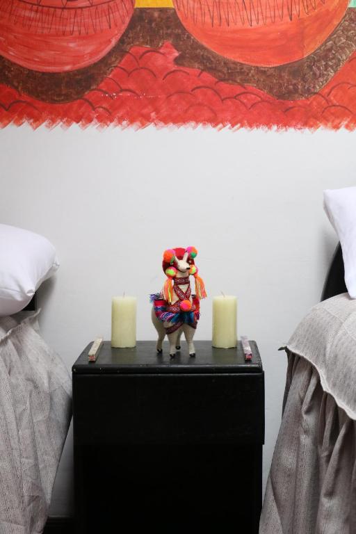 Postel nebo postele na pokoji v ubytování Millas House Cusco
