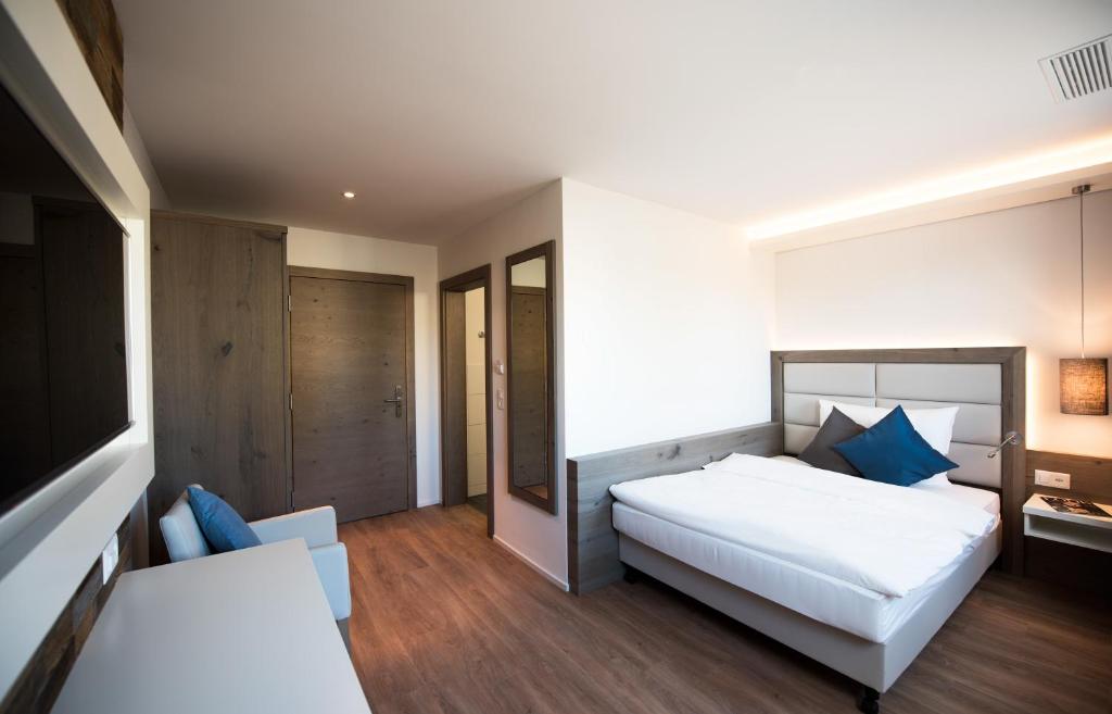 Postel nebo postele na pokoji v ubytování Hotel Rubus