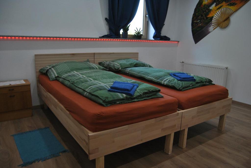 Postel nebo postele na pokoji v ubytování Ferienwohnung Rosenbach