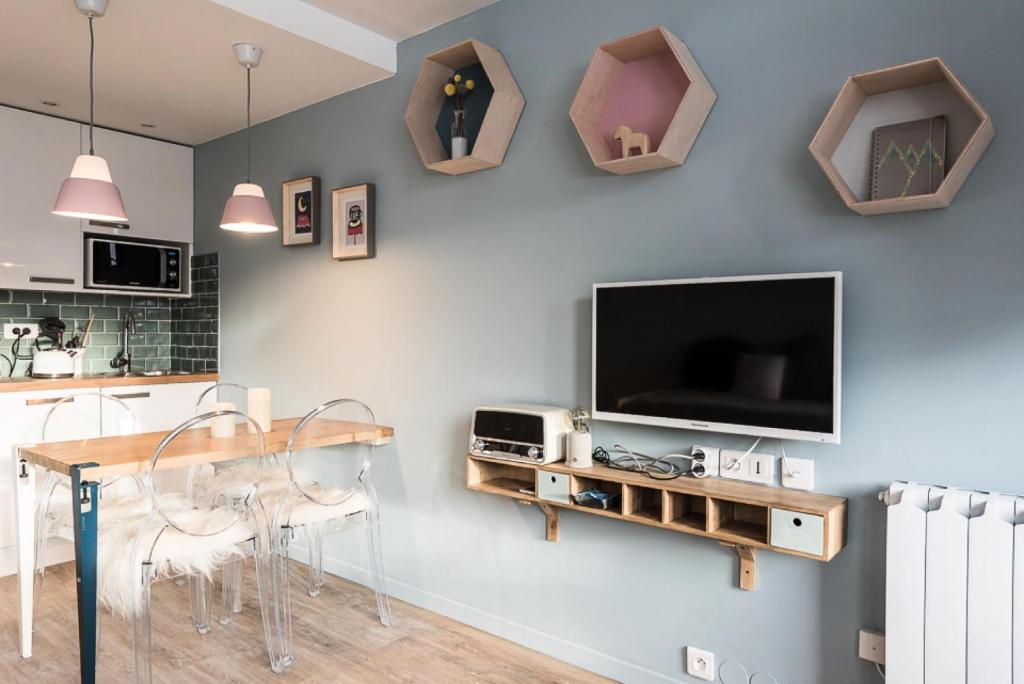 TV a/nebo společenská místnost v ubytování Résidence Home Club - Studio rénové · Proche des pistes et des commerces MAE-7424