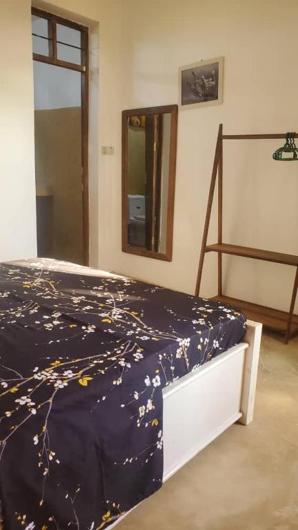 Postel nebo postele na pokoji v ubytování Raphy Home