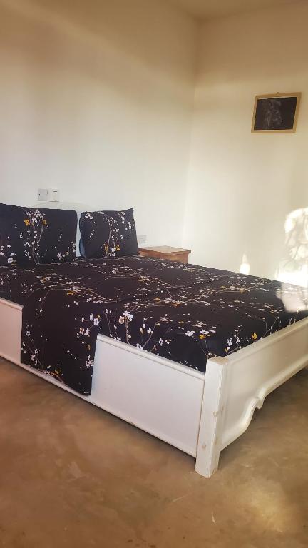 Postel nebo postele na pokoji v ubytování Raphy Home