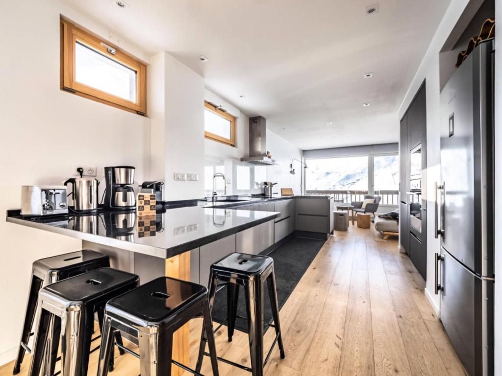 Kuchyňa alebo kuchynka v ubytovaní Résidence Bec Rouge - Appartement rénové ·Skis aux pieds·Balcon MAE-2364