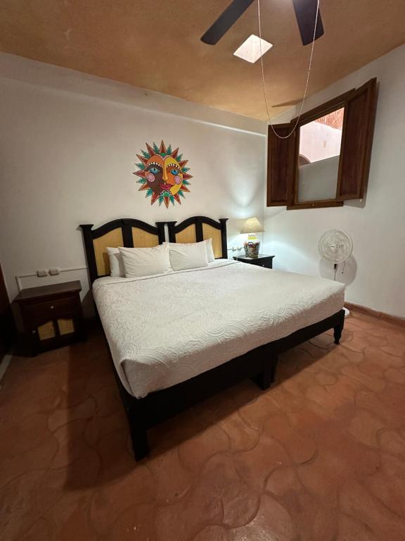 Postel nebo postele na pokoji v ubytování Hotel del Sol