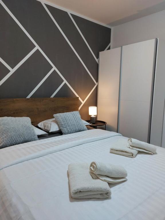 Postel nebo postele na pokoji v ubytování Two Bedroom Apartment