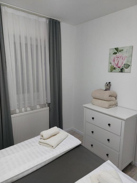 Postel nebo postele na pokoji v ubytování Two Bedroom Apartment