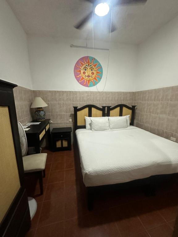 Postel nebo postele na pokoji v ubytování Hotel del Sol