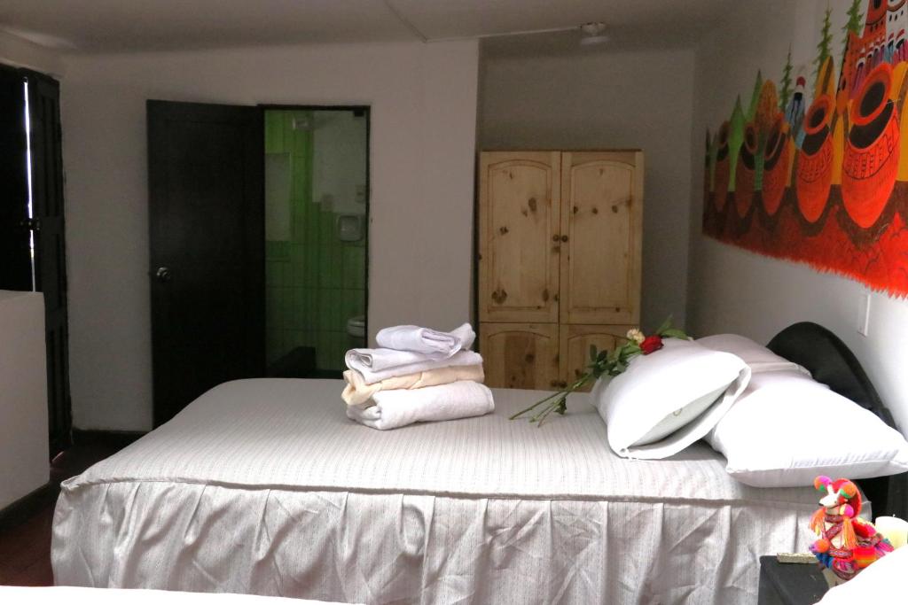 Postel nebo postele na pokoji v ubytování Millas House Cusco