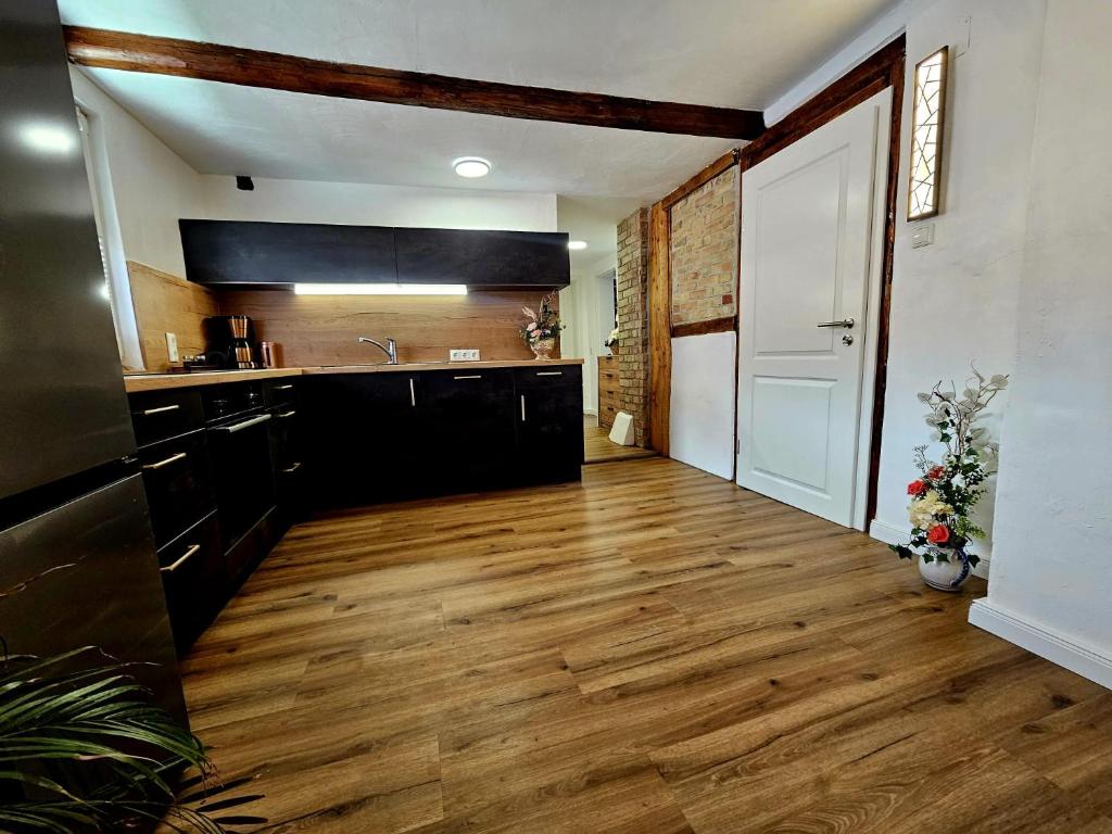 Kuchyň nebo kuchyňský kout v ubytování Ferienwohnung zu den Ilsefällen II