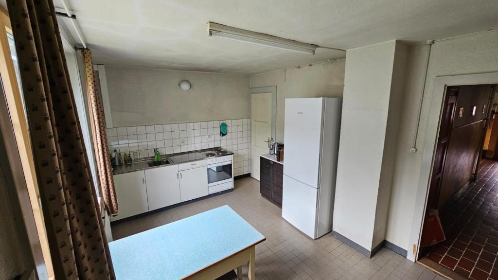 Kuchyň nebo kuchyňský kout v ubytování Chalet Bärgsunne