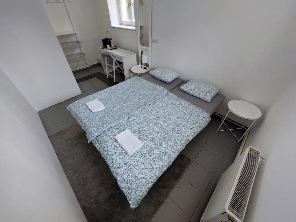 Postel nebo postele na pokoji v ubytování ROSE house - greenline accomodations