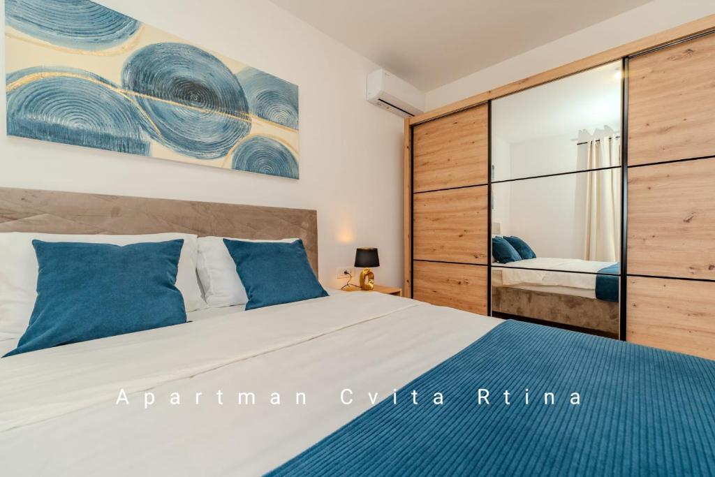Postel nebo postele na pokoji v ubytování Apartman Cvita Rtina