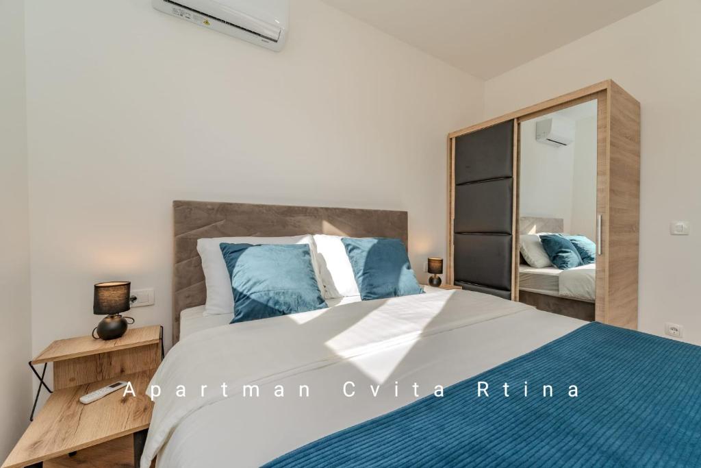 Postel nebo postele na pokoji v ubytování Apartman Cvita Rtina