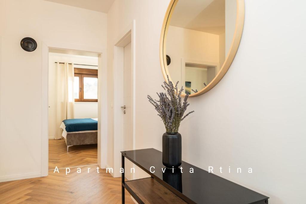 Postel nebo postele na pokoji v ubytování Apartman Cvita Rtina