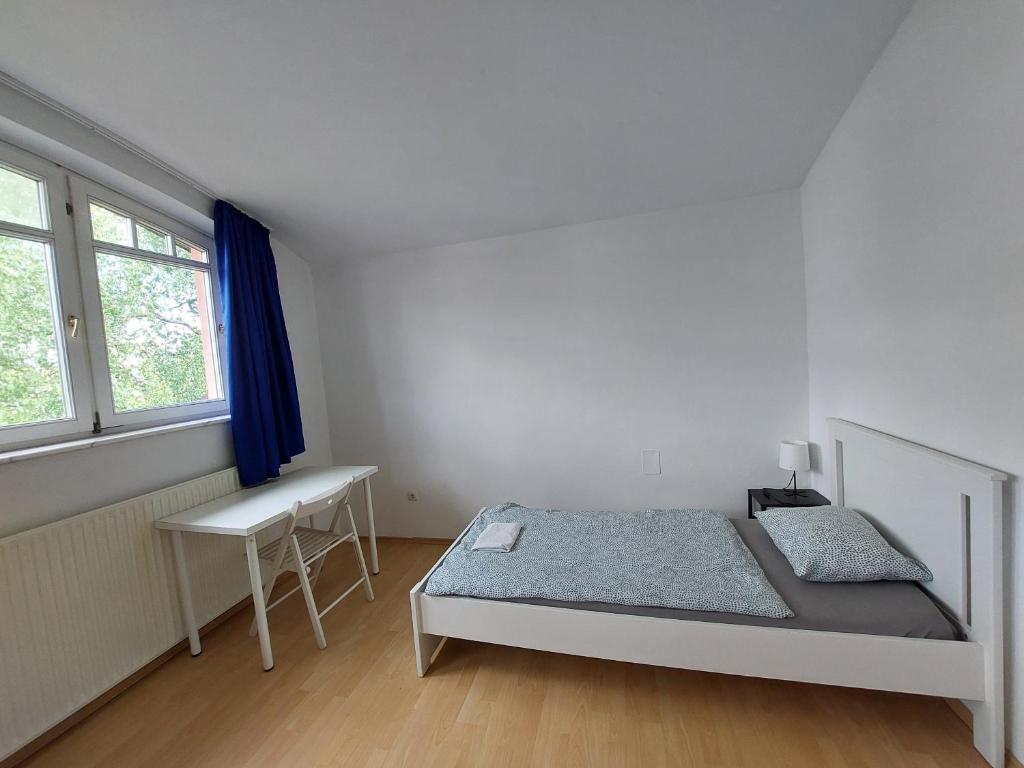 Postel nebo postele na pokoji v ubytování ROSE house - greenline accomodations