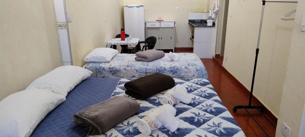 Ένα ή περισσότερα κρεβάτια σε δωμάτιο στο Studio 30m, Wi-fi, próximo ao centro da cidade