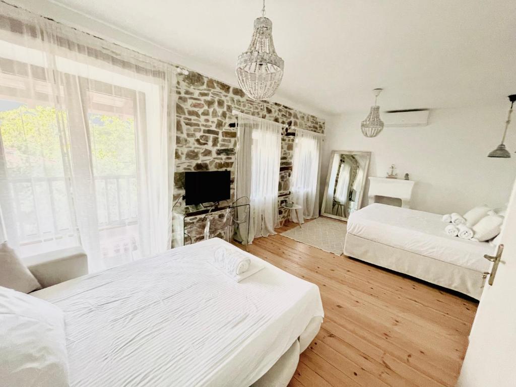 Postel nebo postele na pokoji v ubytování Villa 1880