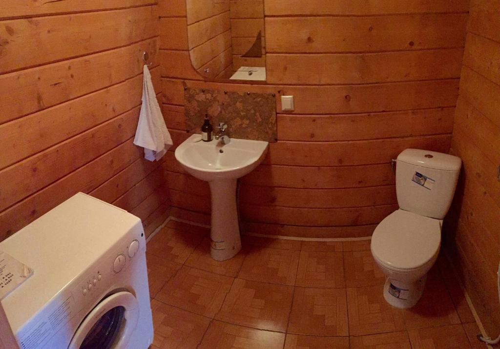 Koupelna v ubytování Villa PidStromom