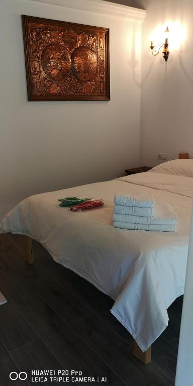Postel nebo postele na pokoji v ubytování Echilibru