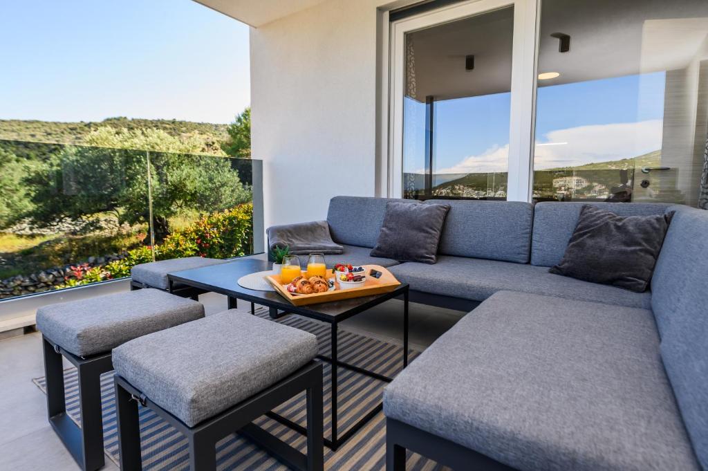 Posezení v ubytování Luxury apartment Barka in Villa with heated pool