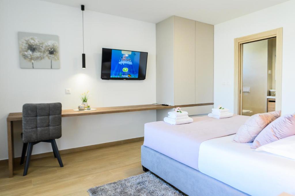 Postel nebo postele na pokoji v ubytování Luxury apartment Barka in Villa with heated pool