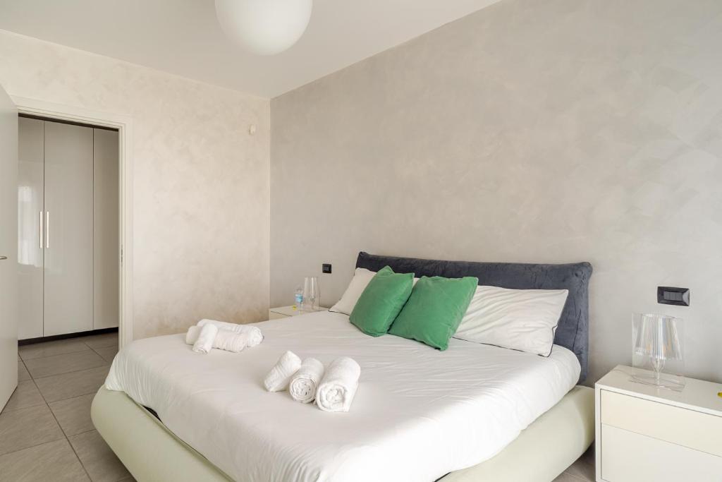 Postel nebo postele na pokoji v ubytování Dalmine Luxury Suite