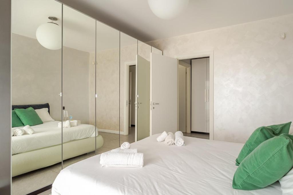 Postel nebo postele na pokoji v ubytování Dalmine Luxury Suite