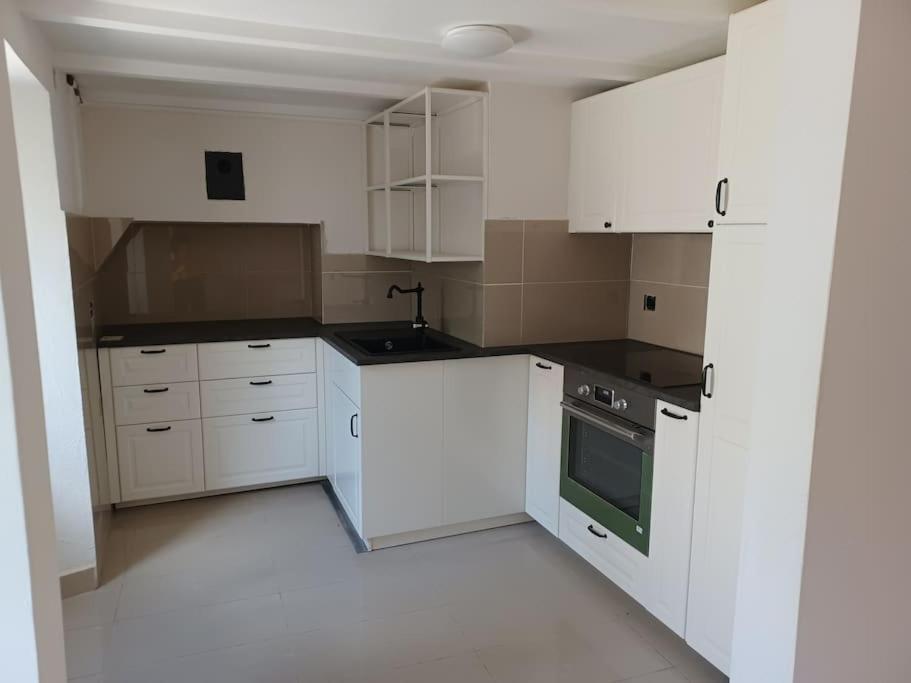 Kuchyň nebo kuchyňský kout v ubytování Casa Leventina