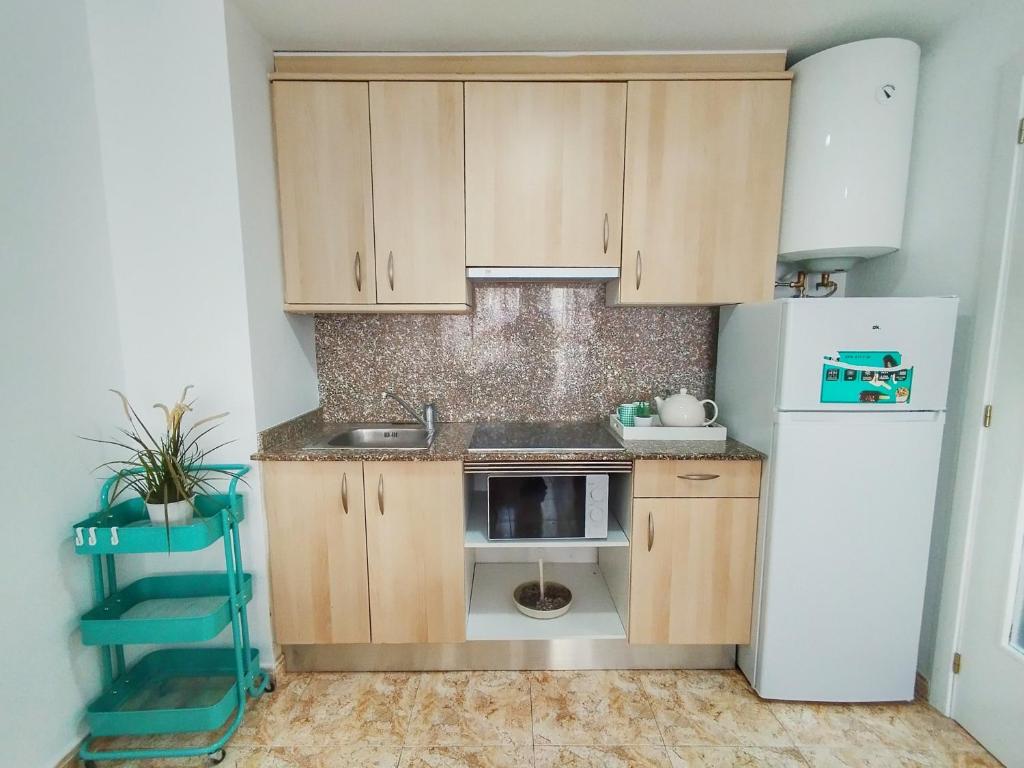 Kuchyň nebo kuchyňský kout v ubytování CBN Apartments
