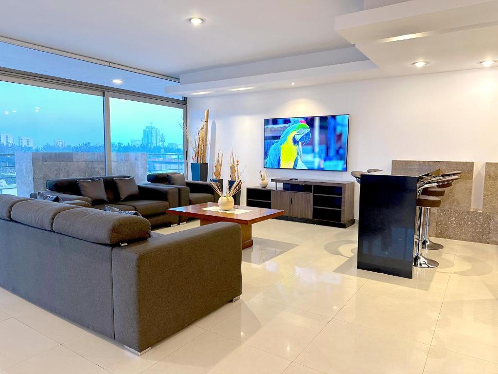 TV a/nebo společenská místnost v ubytování Topacio7 Residencial