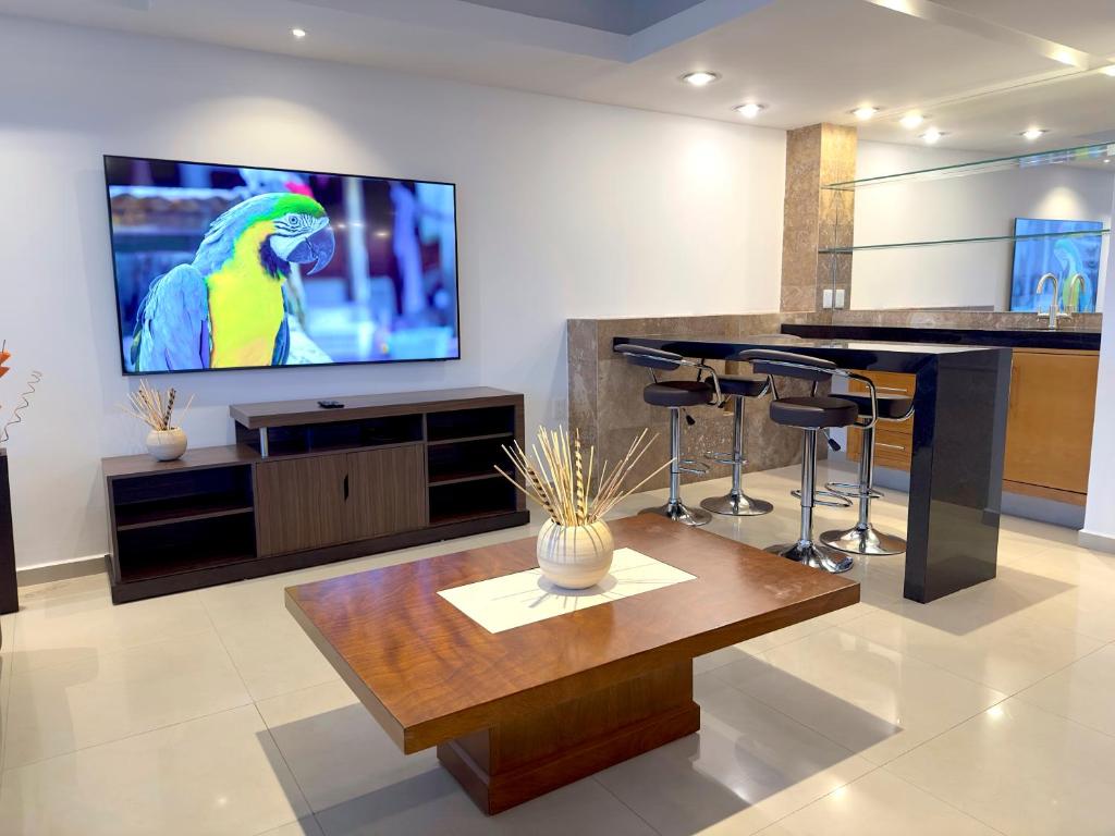 TV a/nebo společenská místnost v ubytování Topacio7 Residencial