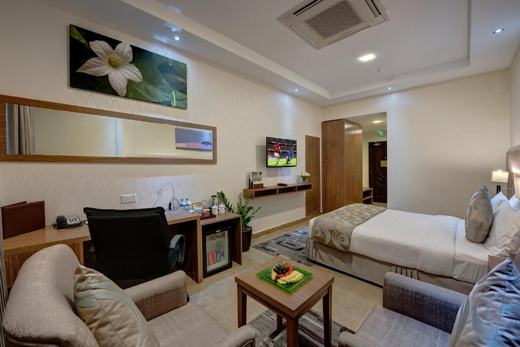 TV a/nebo společenská místnost v ubytování Western Hotel - Ghayathi