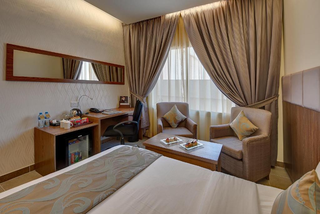 Postel nebo postele na pokoji v ubytování Western Hotel - Ghayathi