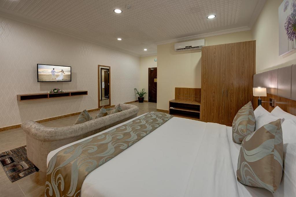 Postel nebo postele na pokoji v ubytování Western Hotel - Ghayathi