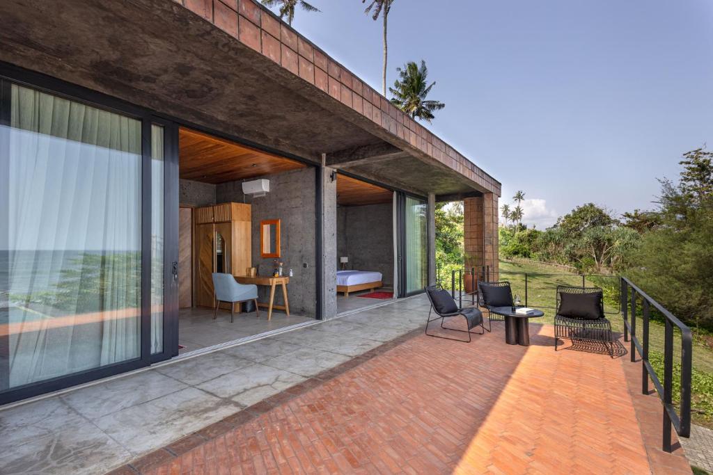 Balkón nebo terasa v ubytování Ultimate Beachfront Villa Cascade Balian