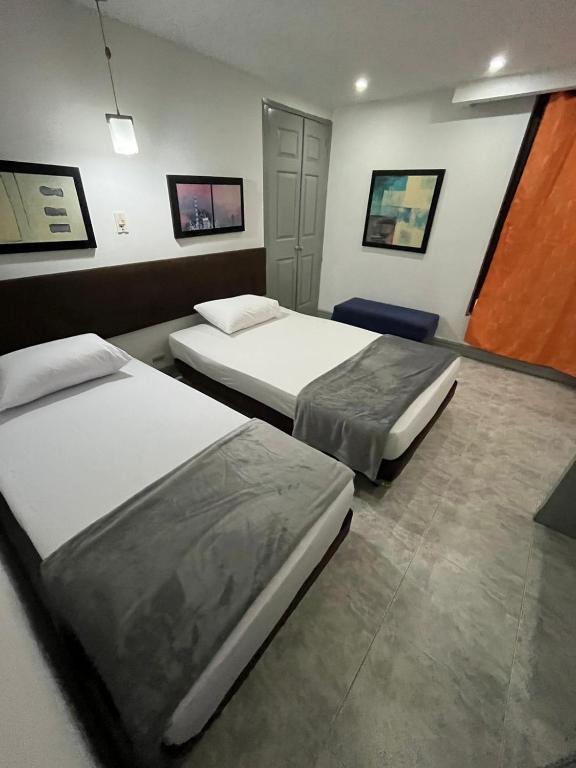 Letto o letti in una camera di Hotel Armenia Lions