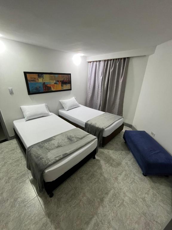Letto o letti in una camera di Hotel Armenia Lions