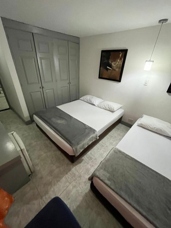 Letto o letti in una camera di Hotel Armenia Lions