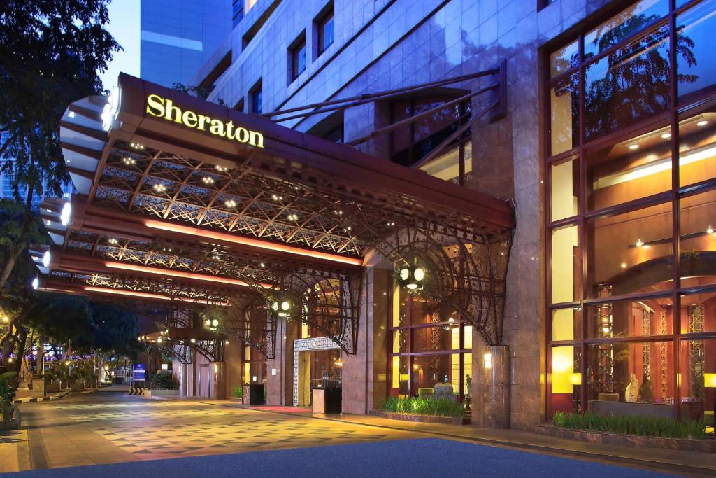 a building with a sign that reads sheridan at Sheraton Imperial Kuala Lumpur Hotel in Kuala Lumpur