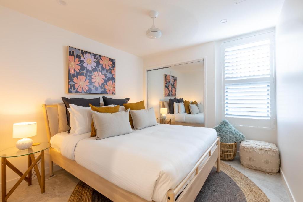 Postel nebo postele na pokoji v ubytování Kings Beach Oceanfront Oasis
